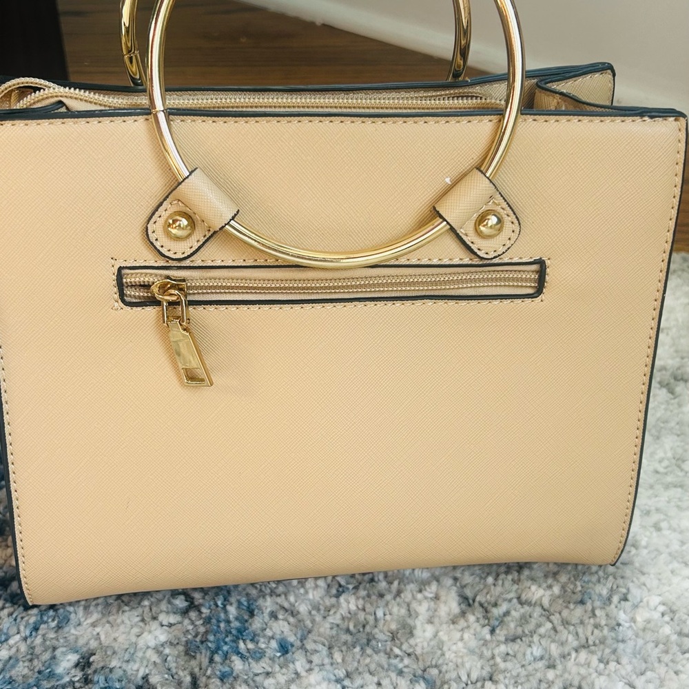 Elegant Cream Handbag with Gold Accents
